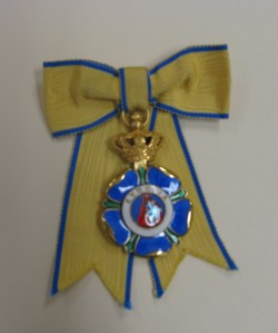 In 1957 Gertrude Smith, Chairman of the Committee on Admissions and Fellowships (1945-1963) was awarded by King Paul of Greece the Cross of Commander in the Royal Order of Beneficence (ΕΥΠΟΙΙΑ) in recognition of her contribution to classical schlarship.