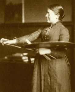 Anna Lea Merritt in her studio, 1886. Photo by Frederick Hollyer.